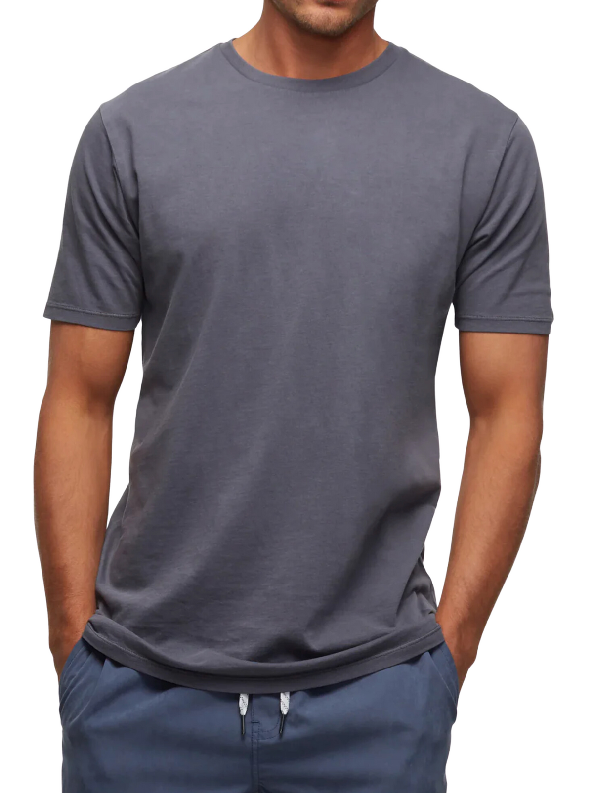 A man models the Industrie The Basic Classic Tee in plain grey with blue drawstring pants, shown from shoulders to hips against a white background.