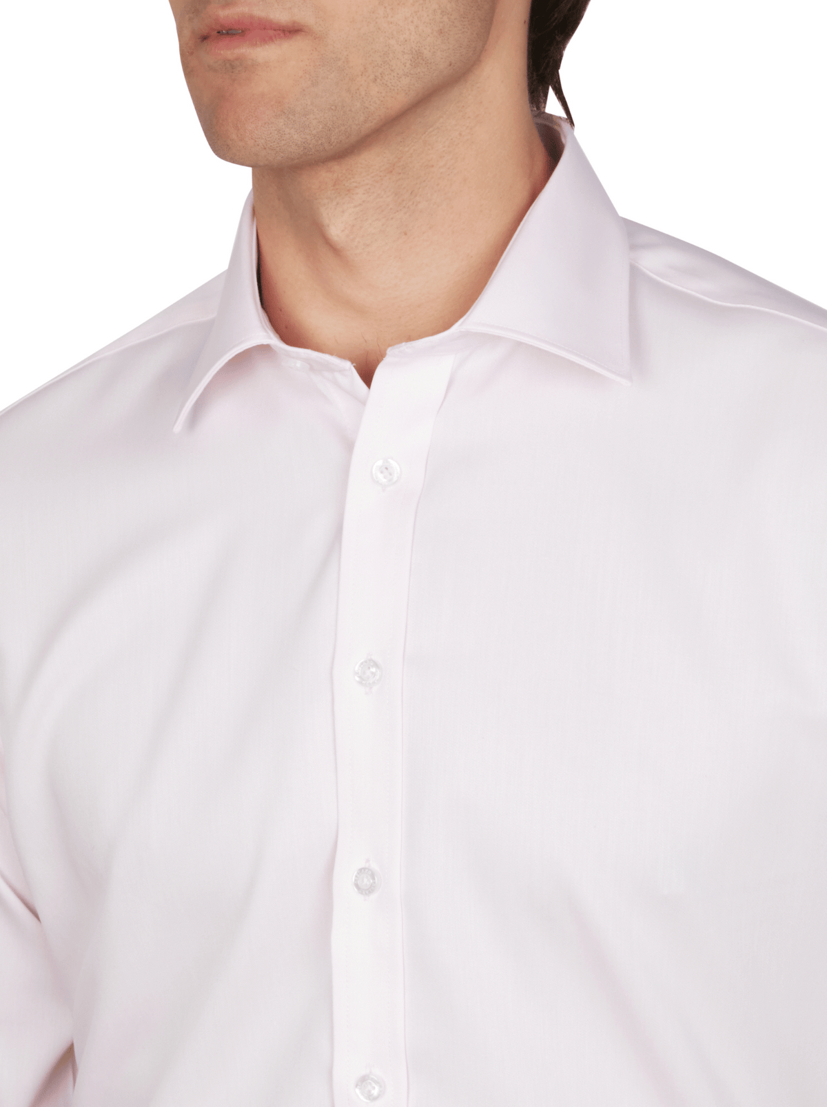 A man wears the Abelard Non Iron Cotton Twill Slim Fit Shirt in light pink with a pointed collar, showing his upper torso and part of his face against a neutral white background.