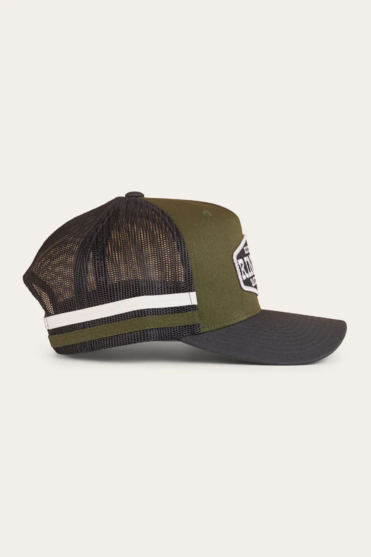 The Ringers Western Banks Trucker Cap features green and black colors, mesh back, cotton twill front panels, a black bill, white and black side stripe, patch logo on the front, and an adjustable snapback closure for comfort.