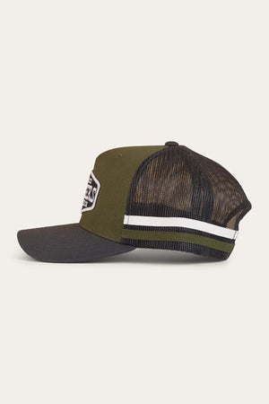 Side view of the Ringers Western Banks Trucker Cap in olive green and black cotton twill, featuring a white and black front patch, black mesh back, snapback closure, and a white stripe above the adjustable strap.