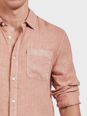 A person models the Academy Brand Hampton Linen Shirt in light pink, sleeves rolled up, showcasing the upper body against a plain white background.