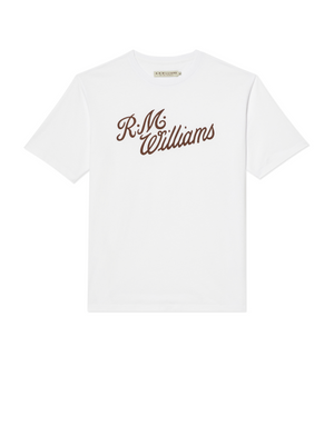 The RM Williams R.M.W Script T-Shirt is a white cotton tee with the iconic logo in dark brown cursive on the front, providing a regular fit for style and comfort.