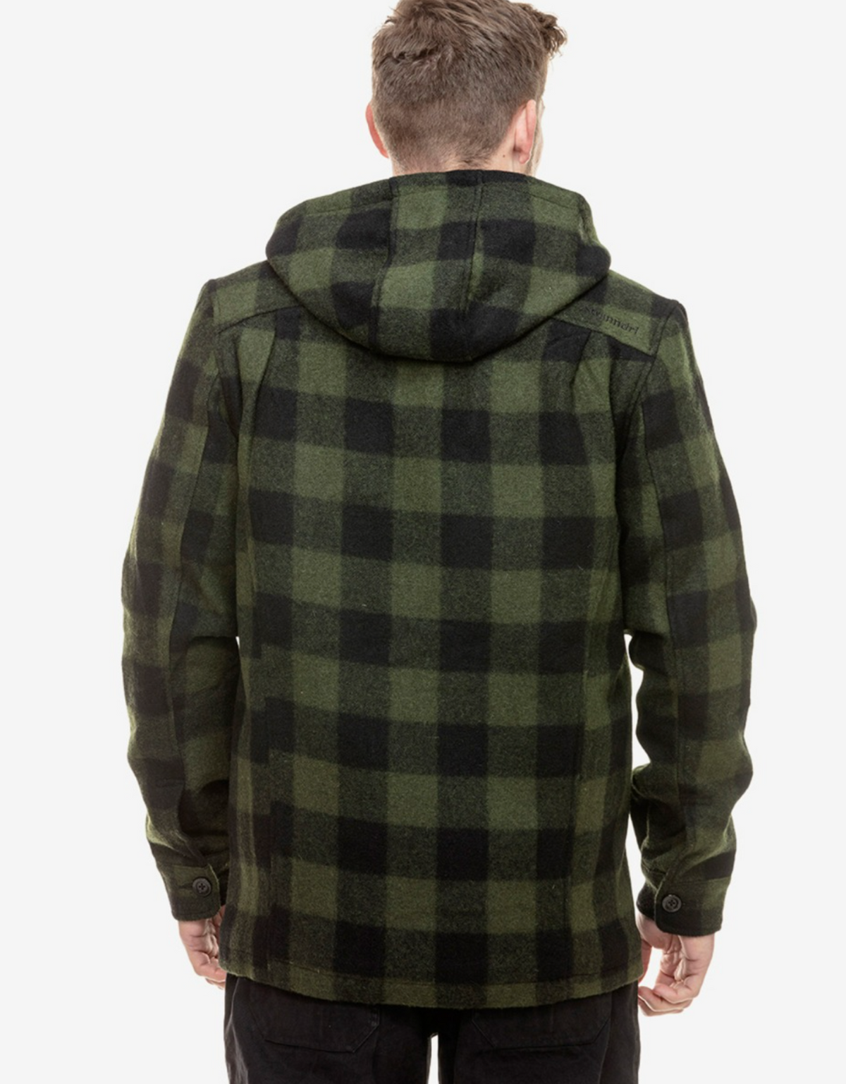 A person with short hair stands with their back to the camera, wearing a cozy Swanndri Hudson Hoody in green and black checkers, made from New Zealand wool. The image captures them waist up against a white background, highlighting its timeless design.