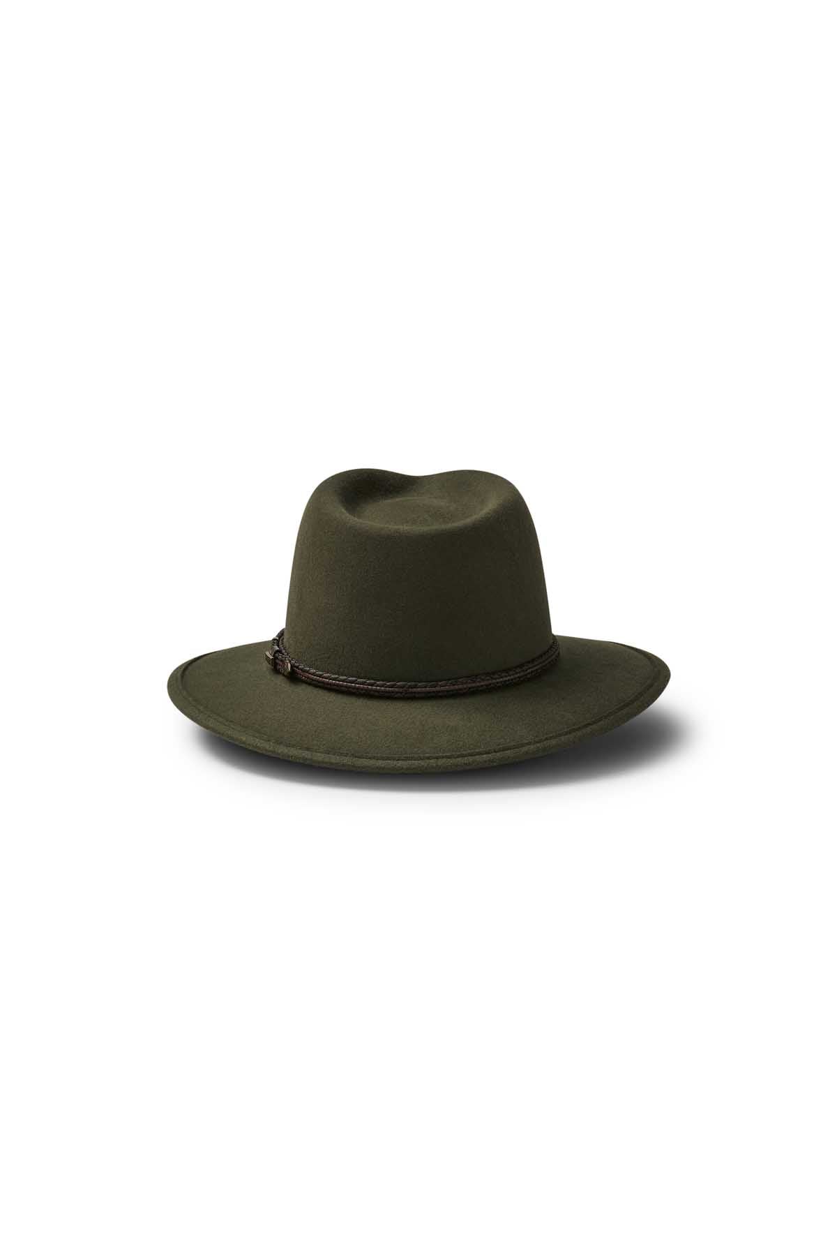 The Akubra Traveller is an olive green wide-brimmed felt hat with a creased crown and braided dark brown band, shown against a plain white background.