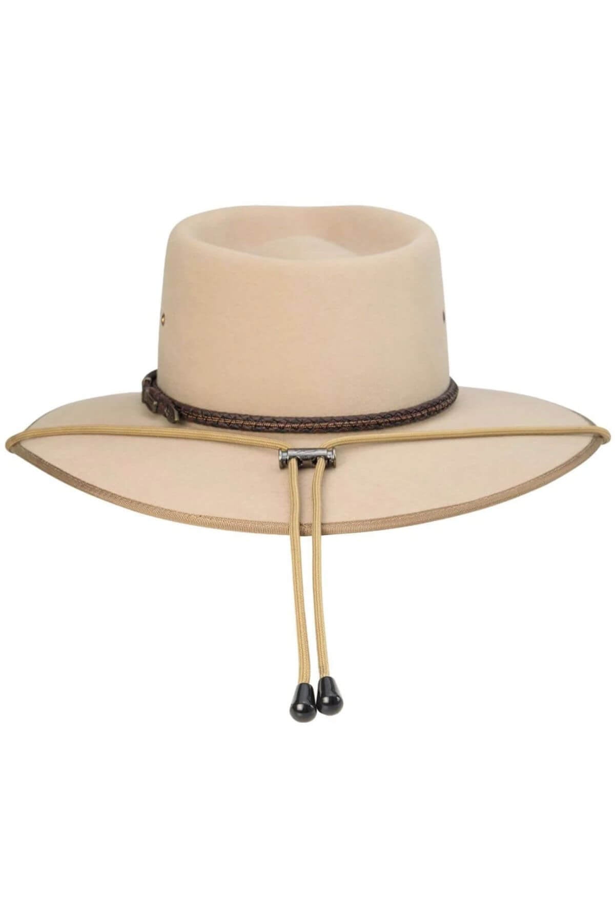 The Akubra Chinstrap is a tan wide-brimmed hat adorned with a decorative band that includes a small loop on the front. The hat features a leather inner sweatband and an adjustable string-ended Akubra Chinstrap with black tips. Its slightly upturned brim sides lend it a timeless, western flair.