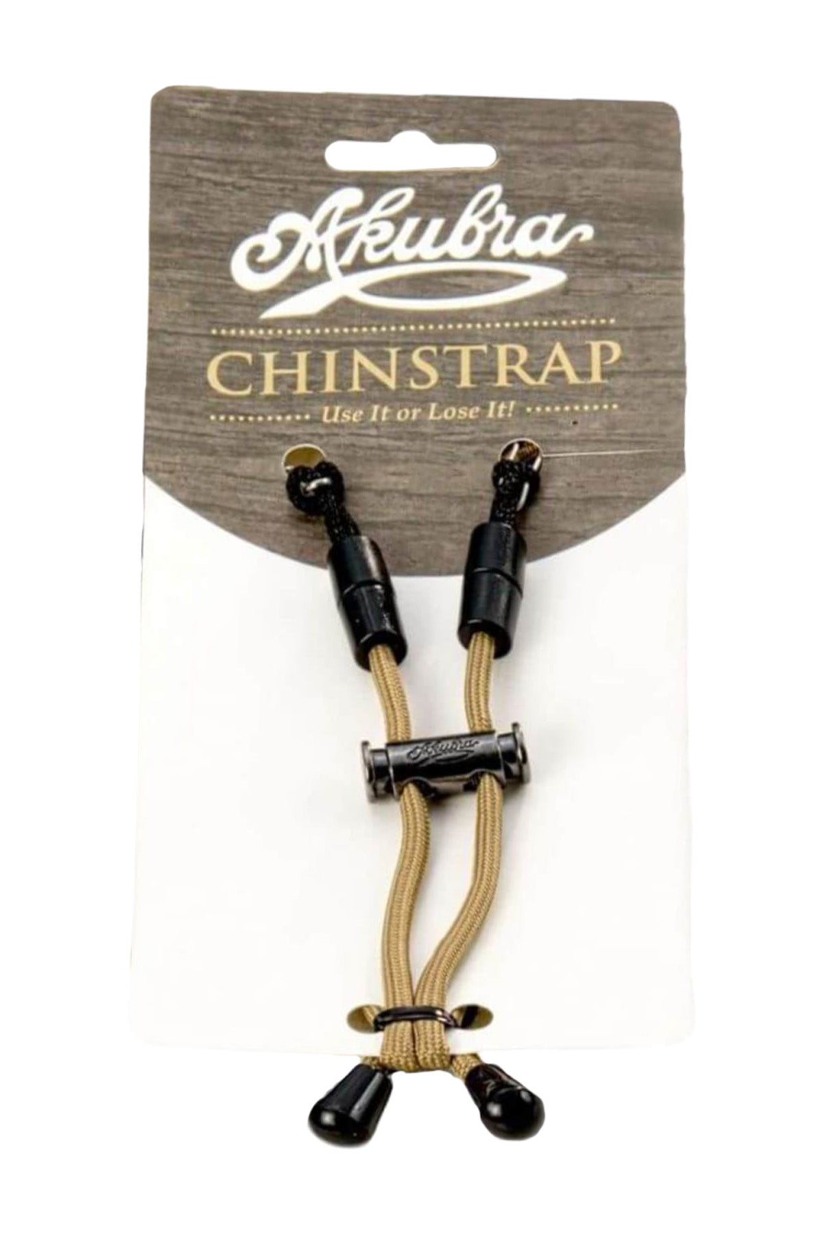 The Akubra Chinstrap package includes a black and beige cord strap, secured with black plastic ends and a central black barrel inscribed with "Akubra." The attractive wooden texture background of the packaging emphasizes the brand name and product details, complemented by a durable leather inner sweatband.