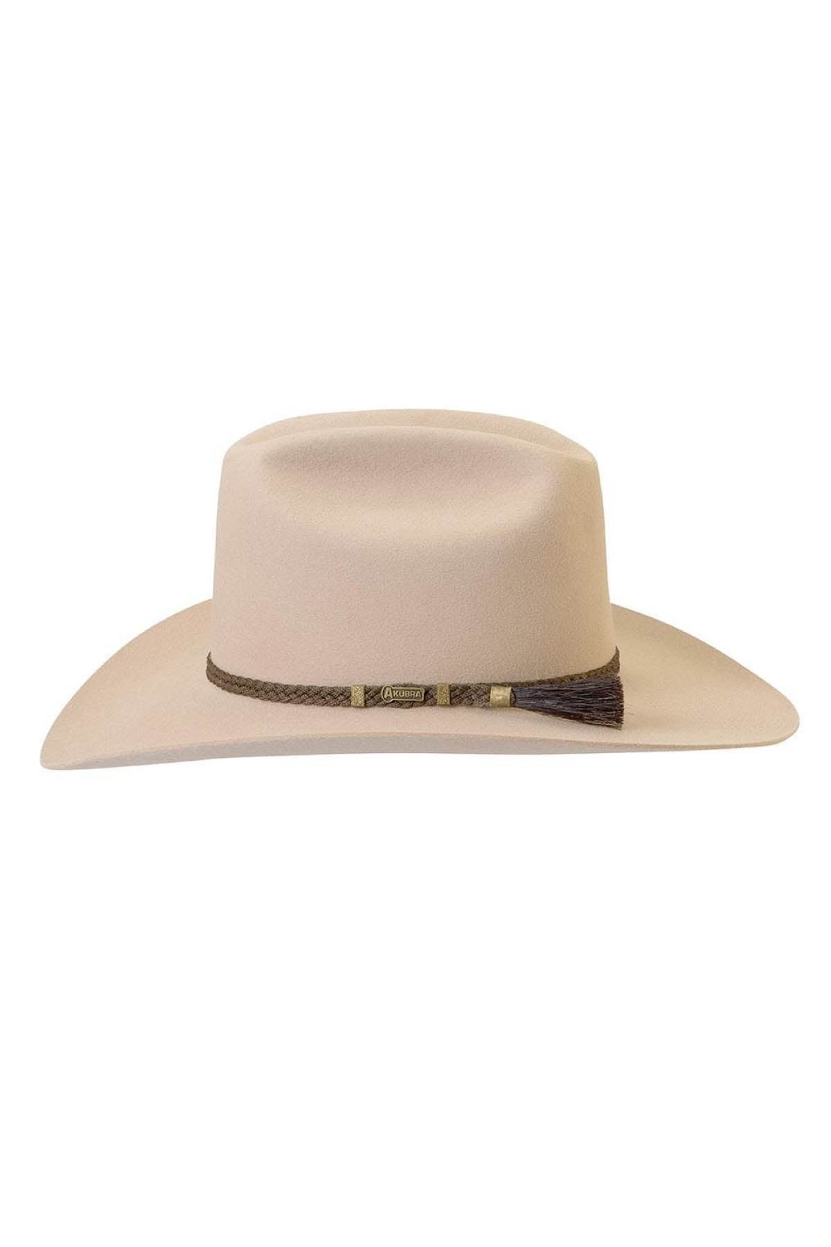 A beige, wide-brimmed Western-style Akubra The Arena hat features a brown braided band with decorative metallic accents. Ideal for any rodeo rider seeking classic elegance. Preserve its beautiful condition with proper Akubra care.
