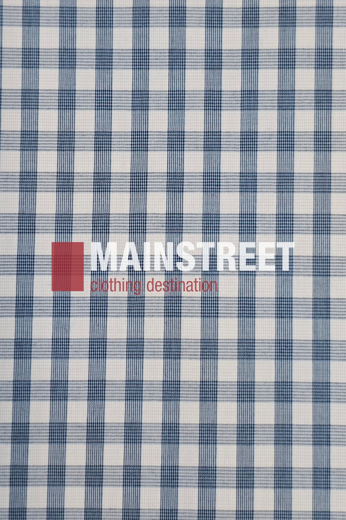 The Bisley Countryman Short Sleeve Shirt is a white cotton shirt with blue plaid, featuring the MAINSTREET logo in bold white, a red square on the left, and "clothing destination" in red below—a fresh twist on classic Countryman style.