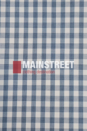 The Bisley Countryman Short Sleeve Shirt is a white cotton shirt with blue plaid, featuring the MAINSTREET logo in bold white, a red square on the left, and "clothing destination" in red below—a fresh twist on classic Countryman style.