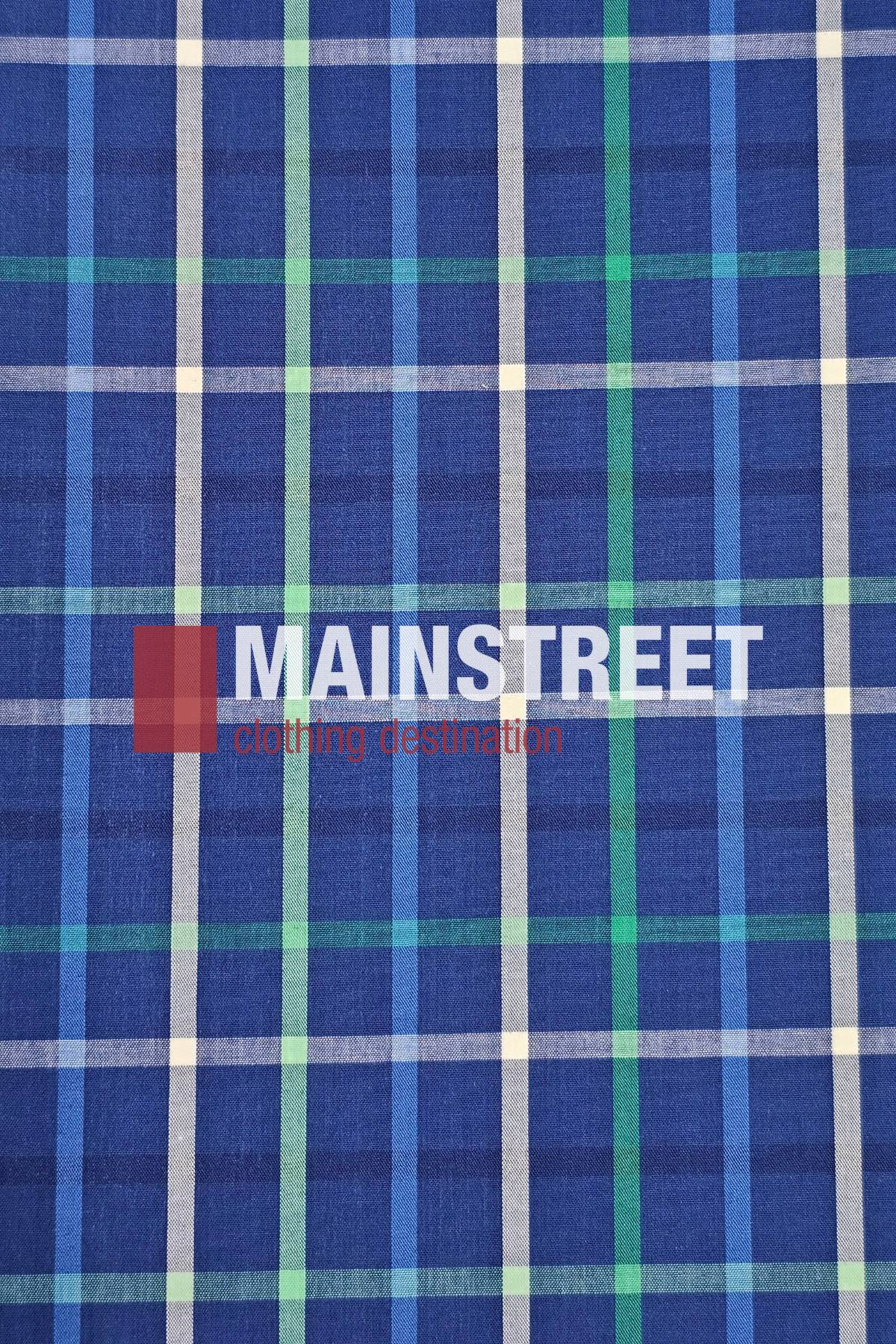 A blue, green, and white plaid polyester/cotton blend showcases the Bisley Countryman Short Sleeve Shirt with "MAINSTREET clothing destination" printed in bold white and red text at the center.