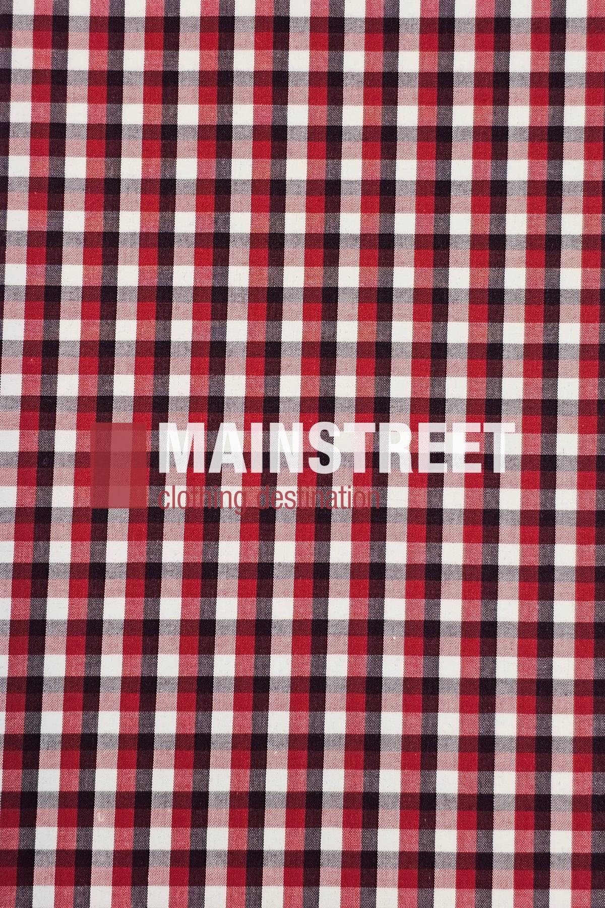 Red, black, and white plaid pattern with “Bisley Countryman Short Sleeve Shirt” printed in bold white and faded red letters across the center, inspired by classic polyester-cotton shirt styles.