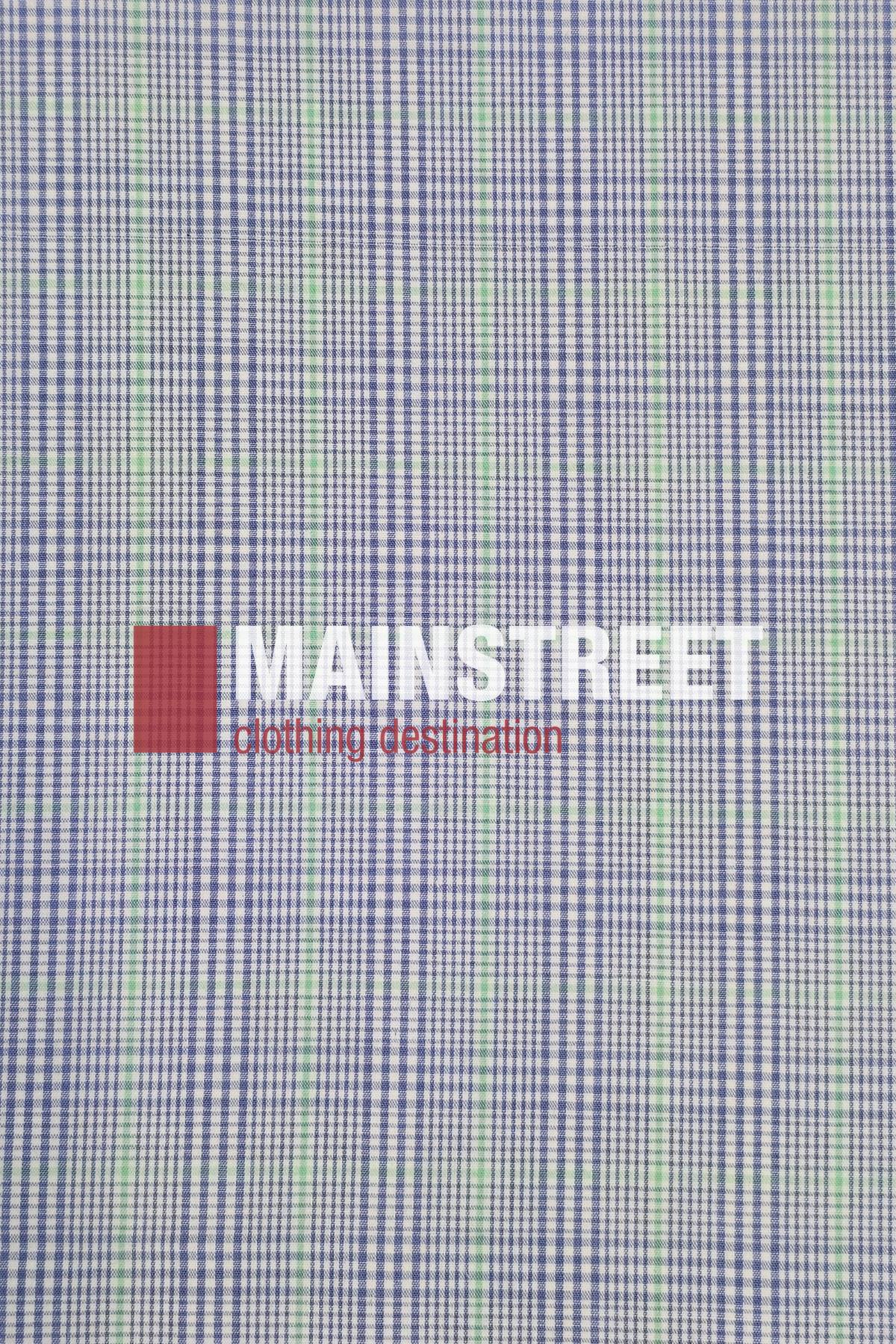 A blue and white checkered fabric with thin green lines evokes the Bisley Countryman Short Sleeve Shirt. Centered is the "MAINSTREET clothing destination" logo, with "MAIN" in bold white and a red square on the left.