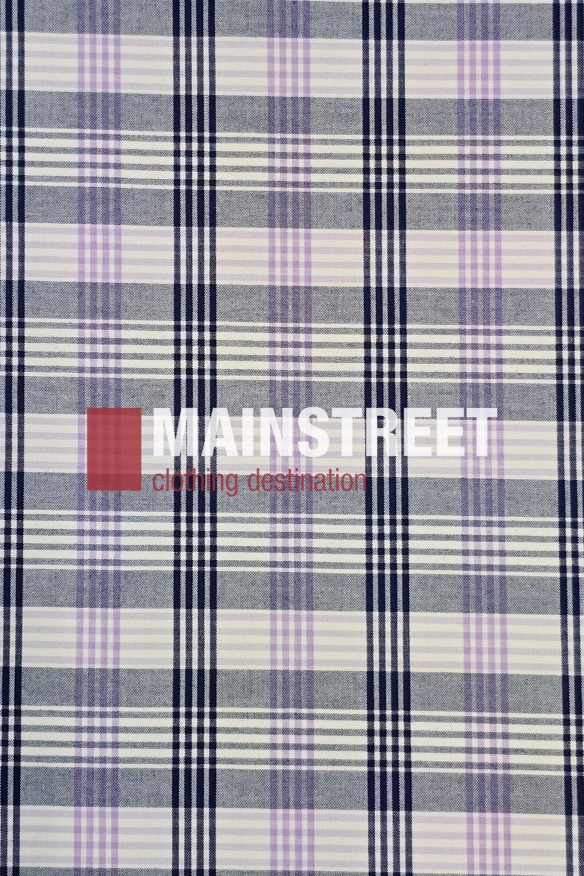 The Bisley Countryman Shirt is made from a polyester/cotton blend with a blue, white, and light purple plaid pattern, featuring "MAINSTREET clothing destination" in bold white and red letters across the center.