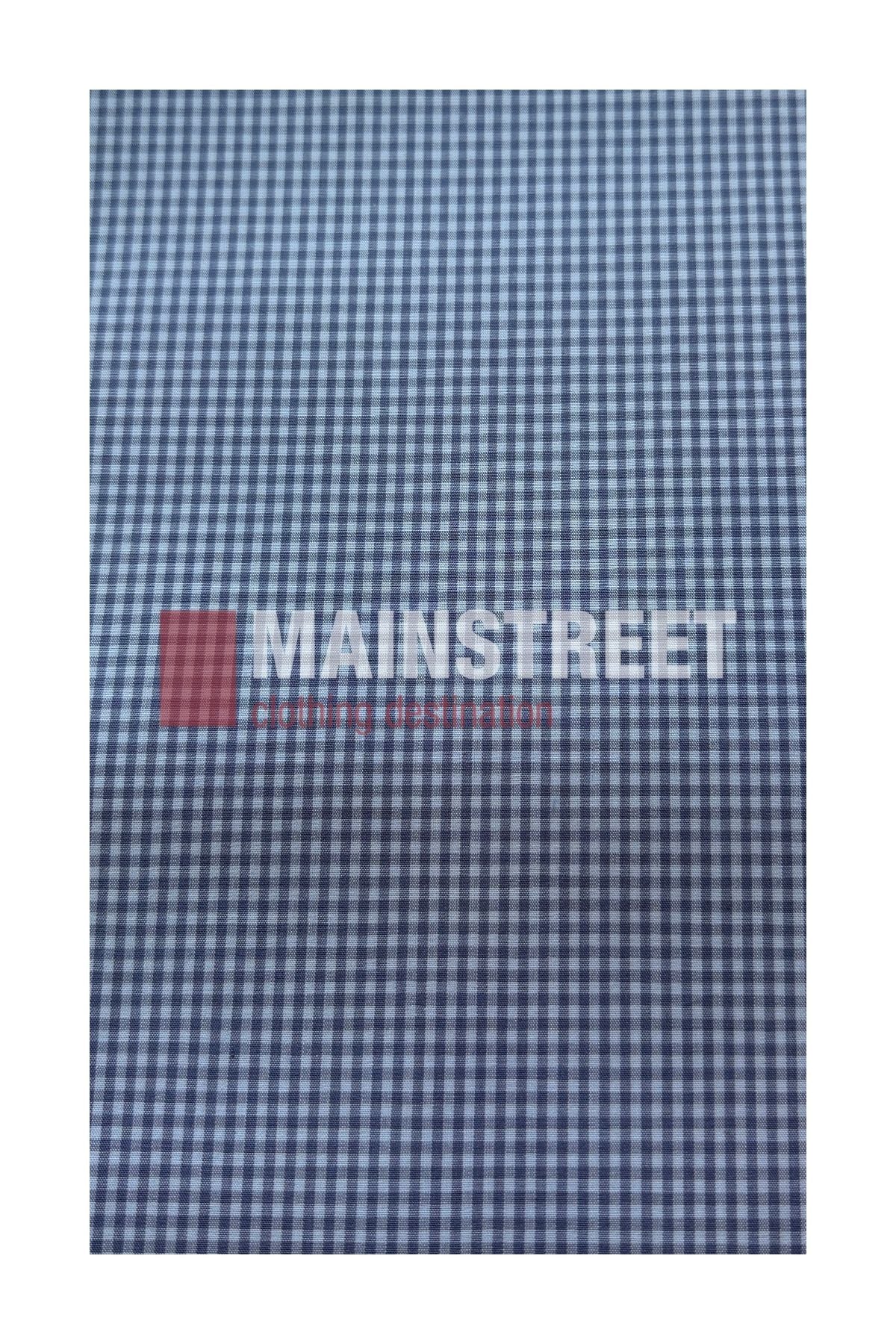 Blue and white gingham checkered fabric with the word “MAINSTREET” and smaller red text over a partially transparent red square, centered on the pattern. Inspired by the classic Bisley Countryman Short Sleeve Shirt, this design features a comfortable and durable polyester/cotton blend, offering timeless country style.