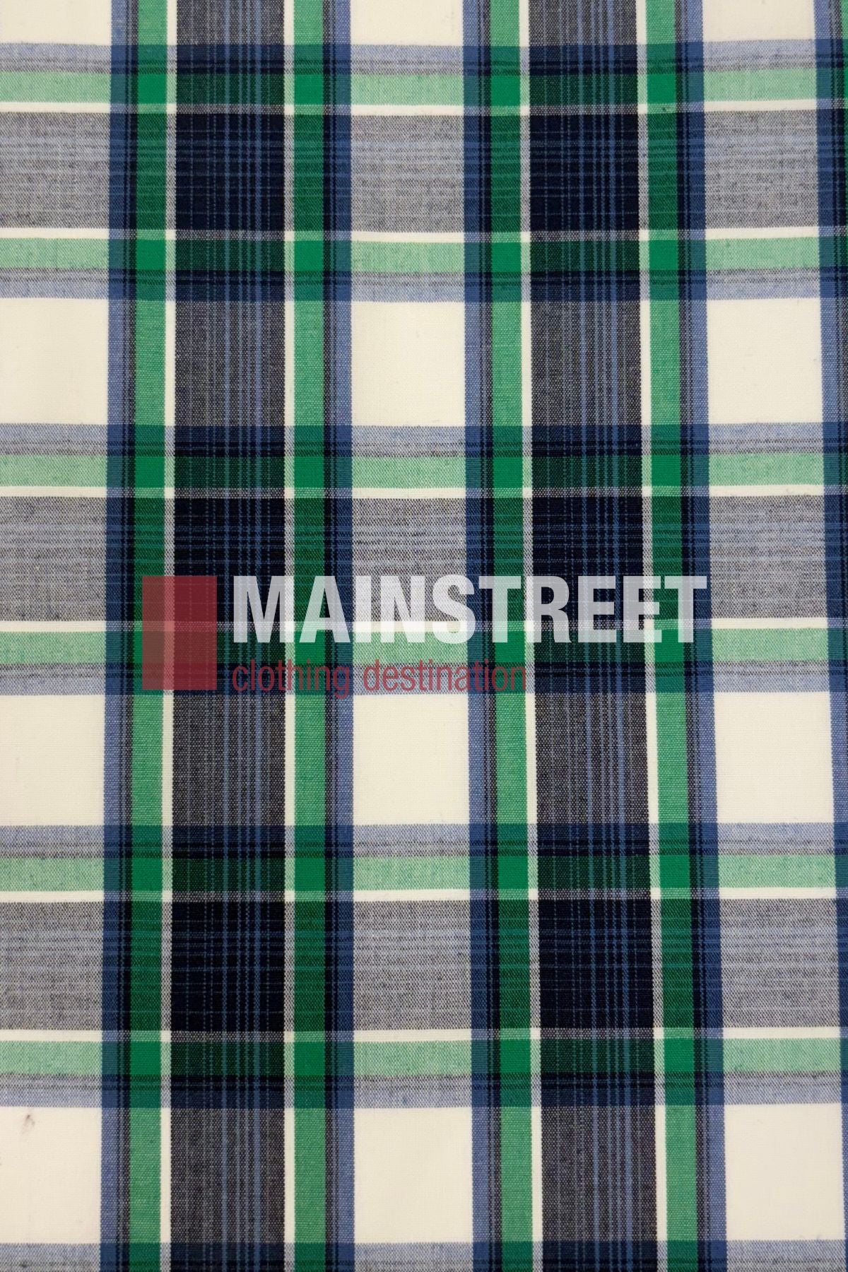 The Bisley Western Shirt features a plaid fabric with blue, green, white, and black stripes on a durable polyester/cotton blend. The "MAINSTREET clothing destination" logo appears in bold white and red lettering.