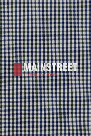 A blue, green, and white checkered pattern features the words "Bisley Countryman Shirt" overlaid in bold white and red text.