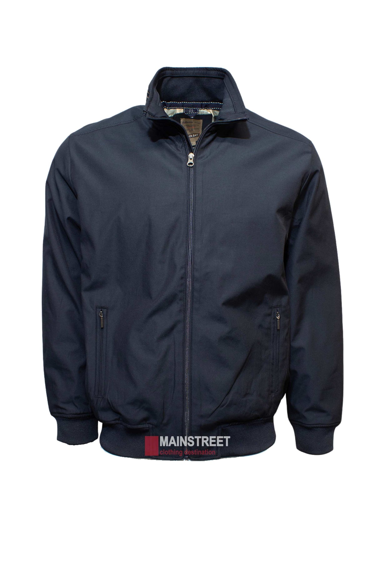 A Back Bay Blouson Jacket in navy blue, featuring a high collar and zip-up pockets. This stylish jacket is designed with elastic cuffs and hem for a snug fit, and a partially visible "MAINSTREET" clothing tag at the bottom.
