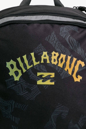 The Billabong Juggernaut Backpack features the brand name in yellow stylized font on a subtle background, with a top zipper, adjustable padded shoulder straps, and a handy laptop compartment.