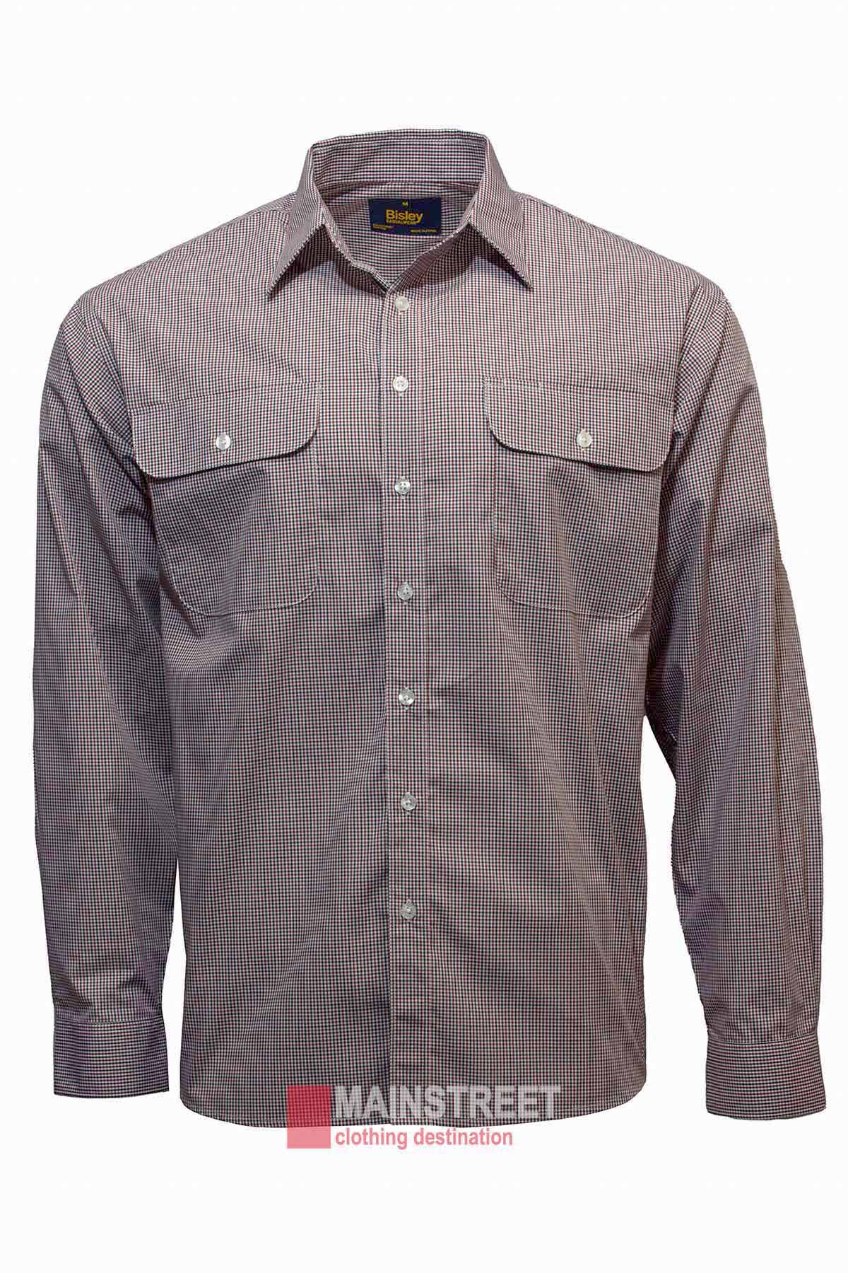 The Bisley Countryman Shirt is a long-sleeved, button-down shirt with a fine pinstripe pattern. It features two breast pockets with button flaps and a pointed collar. Crafted from a durable polyester/cotton blend, the shirt boasts a plain white background with a partial text watermark reading "MAINSTREET clothing destination.