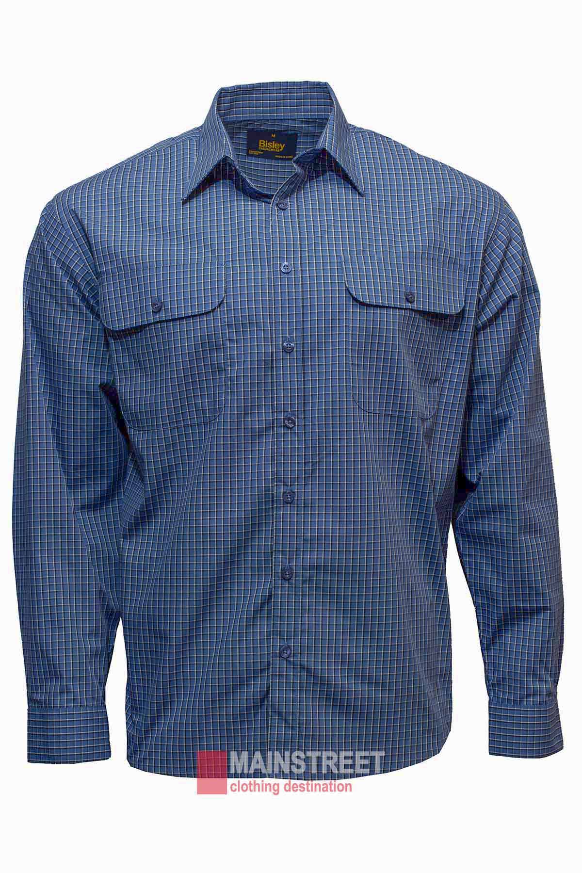 A long-sleeved, blue plaid men's Bisley Countryman Shirt with a button-up front and two chest pockets. Made from a durable polyester/cotton blend, the label on the collar displays the brand "Bisley," and text at the bottom indicates "Mainstreet" as the clothing destination.