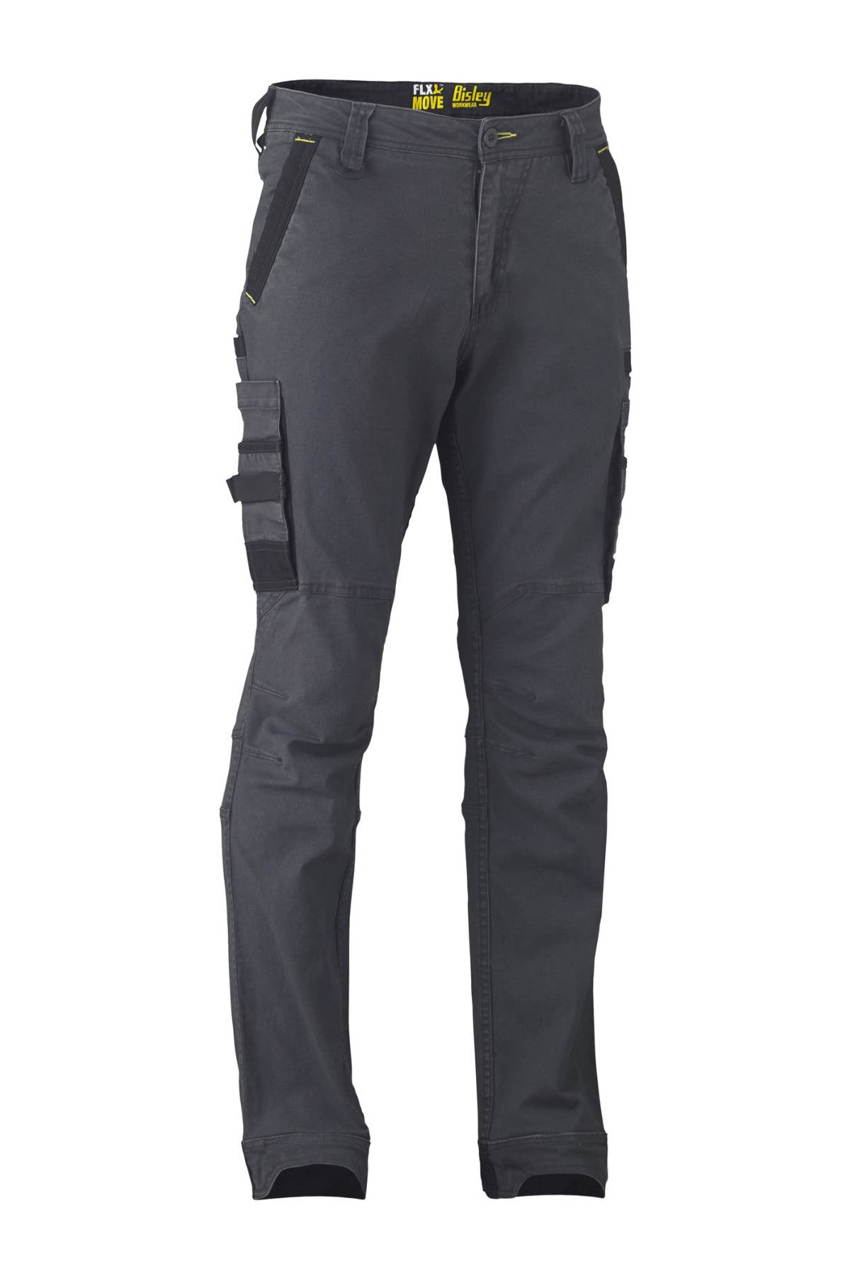 The Bisley Flex & Move Stretch Utility Cargo Pant, in dark gray with black accents, includes multiple cargo pockets and Cordura-reinforced knees. A yellow brand label is positioned at the back of the waistband. These pants are crafted to offer both comfort and practicality.