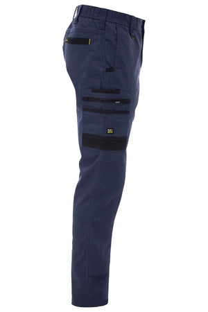 A side view of the Bisley Flex & Move Stretch Canvas Elastic Waist Cargo Pant in blue, featuring black Cordura® panels and several zippered and flap pockets on the thigh and hip.