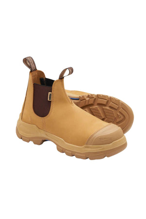 The Blundstone RotoFlex 9000 Elastic Sided Safety Boot is a pair of light brown, water-resistant nubuck leather slip-on work boots. They feature pull tabs at the heel and tongue, reinforced toe areas, and black elastic side panels. These boots boast thick outsoles with a sturdy tread pattern and are displayed against a white background.