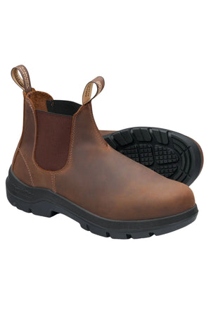 A pair of Blundstone 720 WorkLife Series Non Safety Boots in premium Teak leather with black rubber soles, elastic side panels, and pull tabs. One boot stands upright; the other lies on its side to display the tread.