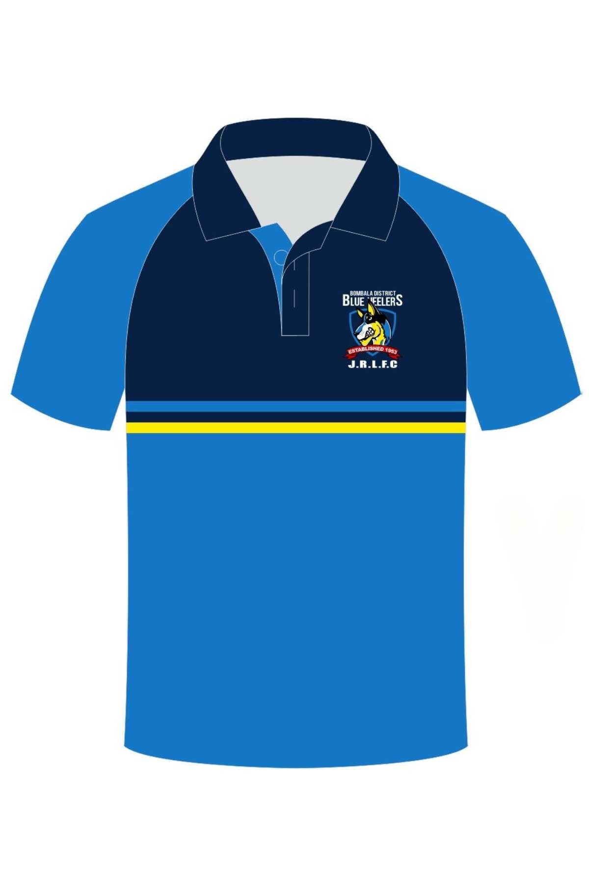 The Bombala Junior Blue Heelers Sublimated Club Polo features a collar, the Blue Heelers J.R.L.F.C. logo and text on the left chest, yellow and white mid-stripes, in blue/navy colors. Available now as a pre-order item.