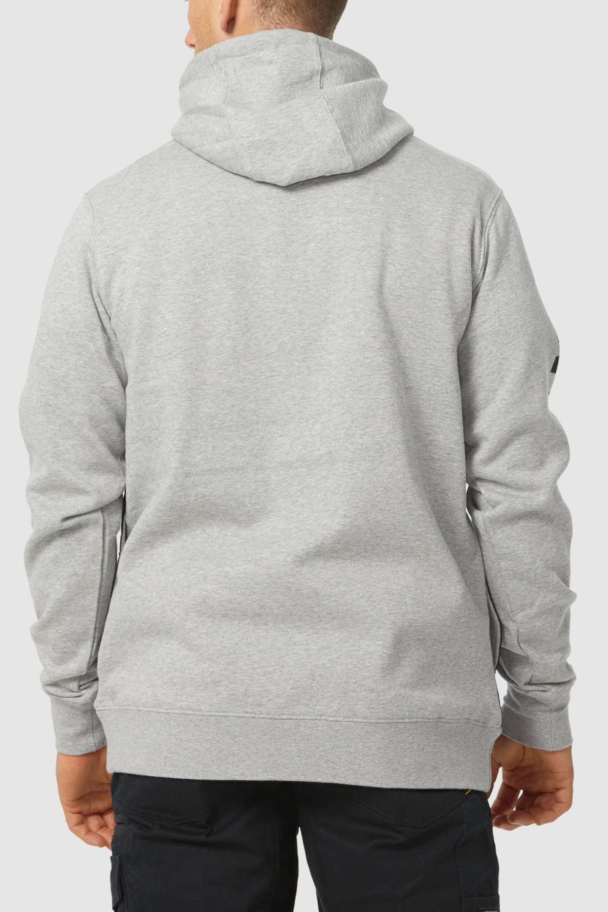 Viewed from the back, the person wears a light gray CAT Stillwater 1/4 Zip Hoodie. This stylish hoodie features a hood and long sleeves, paired with black pants against a plain, light-colored background, and includes S3 Cord Management for convenience.