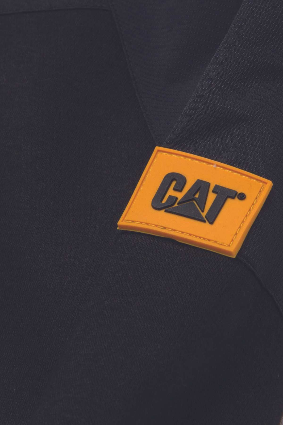 Close-up of the CAT Trades Full Zip Hoodie in black, made from abrasion resistant fabric, with a yellow rectangular patch featuring the bold black CAT logo sewn on the upper sleeve.