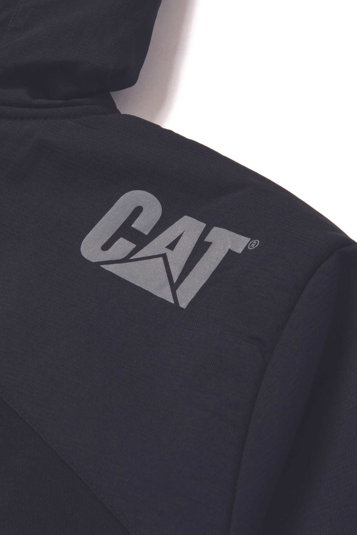 Close-up of the CAT Trades Full Zip Hoodie in black, featuring a grey, abrasion-resistant "CAT" logo with a triangular design element on the upper shoulder.