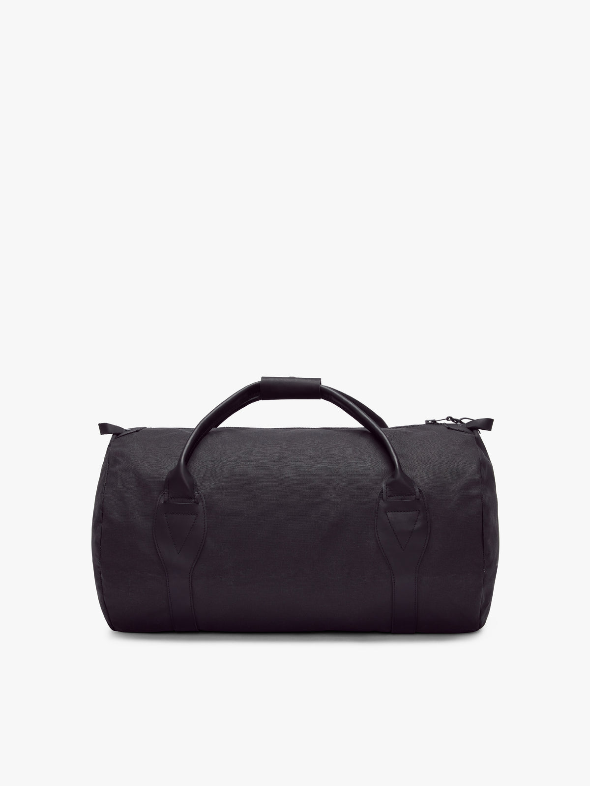 The RM Williams Canvas Ute Bag is a black duffel with water-resistant fabric, dual handles, and a shoulder strap, shown against a plain white background.