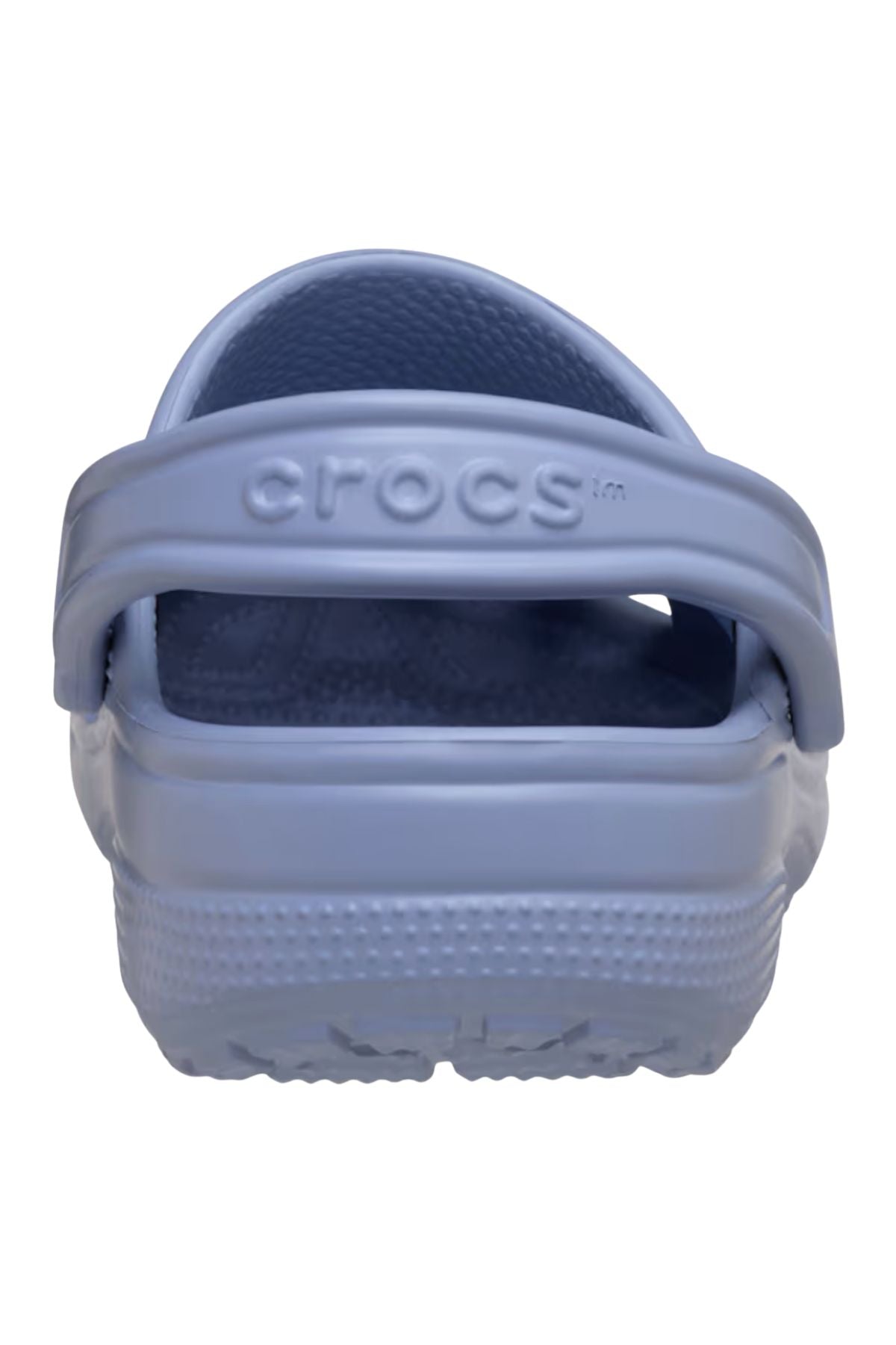 A close-up rear view of the Crocs Classic Clog shows its textured sole, branded heel strap, and back opening—lightweight and breathable footwear designed for water adventures.