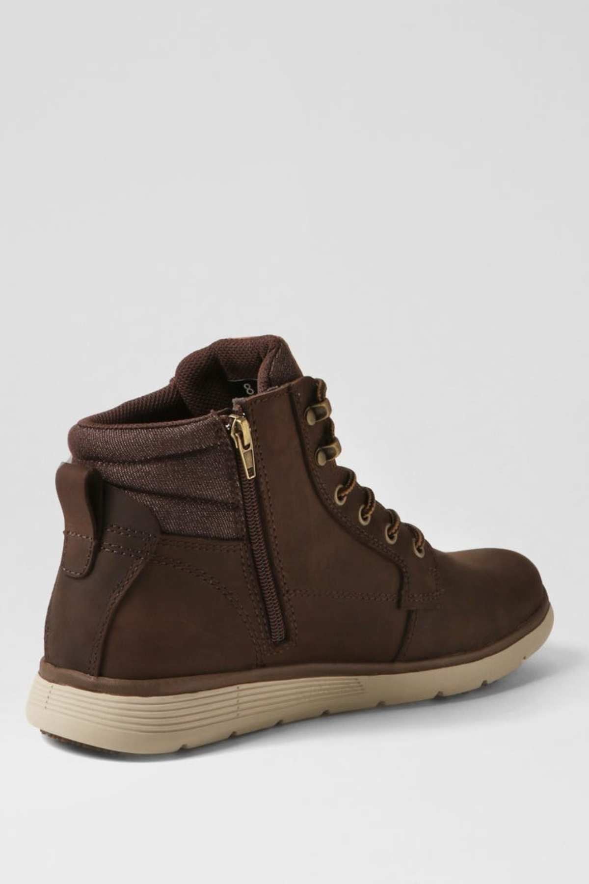 The Colorado Yrbud Boot is a brown ankle-high boot with a tan slip-resistant sole, side zipper, lace-up front, and padded collar, shown against a plain light gray background.