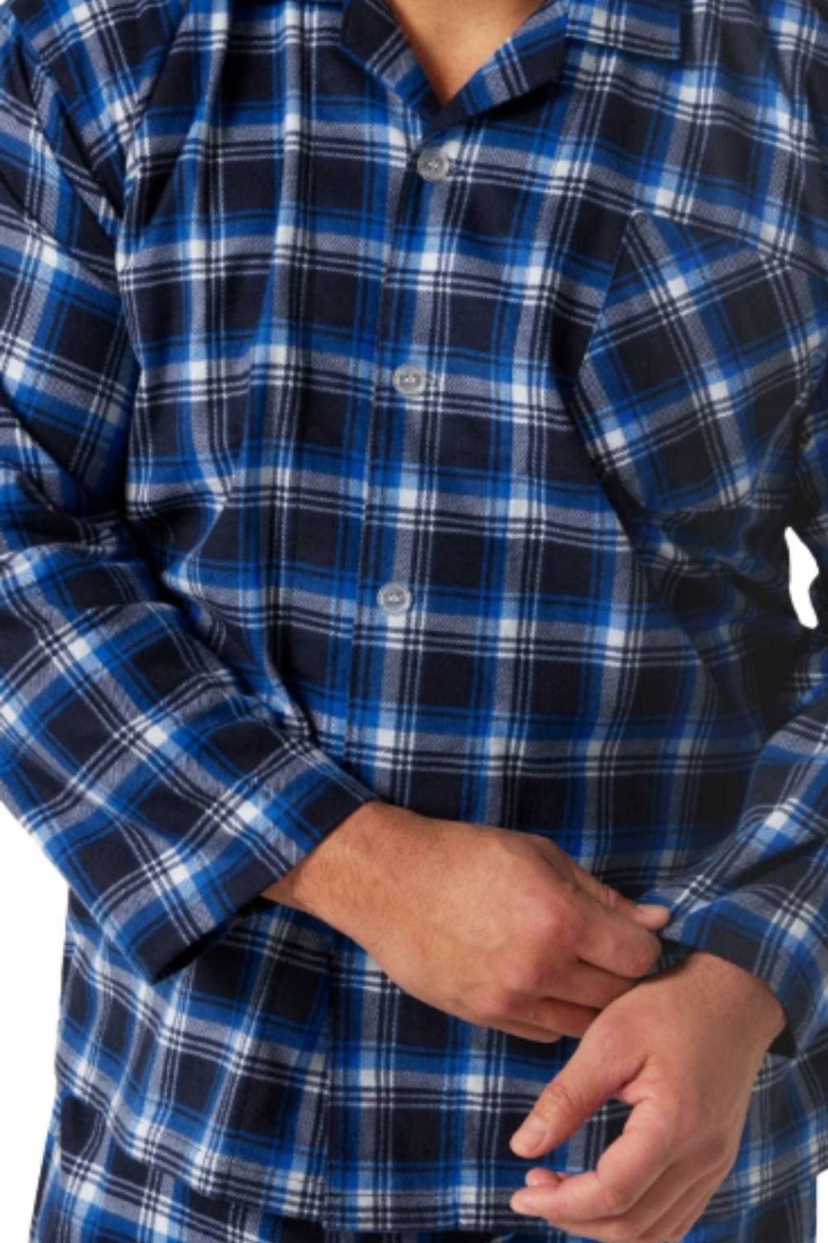 A person in the Contare Country Winter Flannelette PJ Set, blue and white plaid, buttons their cuff. Only the torso and hands are visible, highlighting the cozy comfort of these 100% cotton pajamas.
