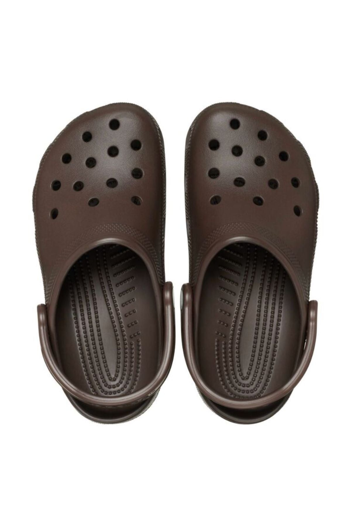 A pair of Crocs Classic Clog in dark brown with ventilation holes and adjustable heel straps, shown from above on a white background—lightweight, breathable footwear ideal for water adventures.