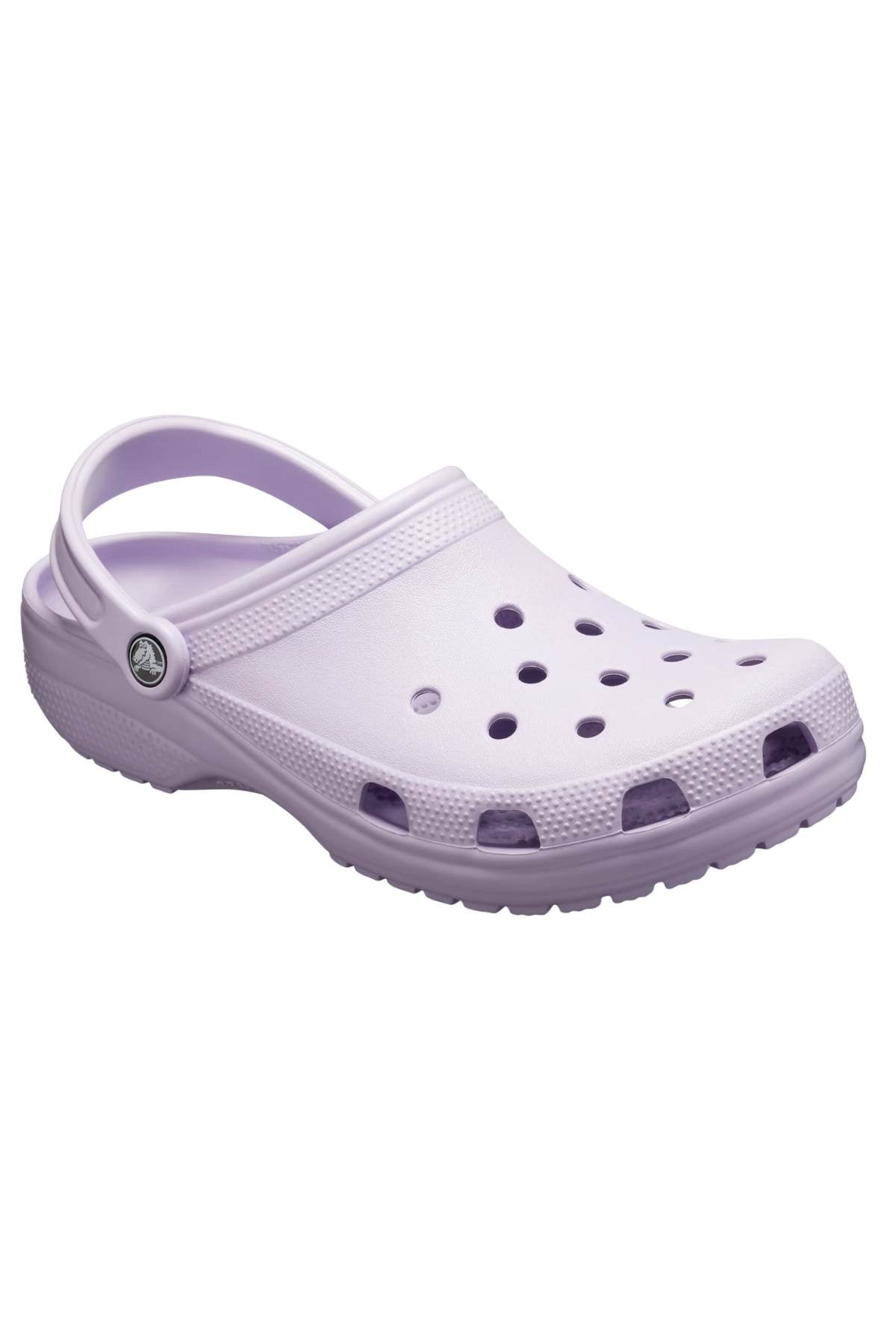 A Crocs Classic Clog in lavender, featuring ventilation holes and an adjustable heel strap for a lightweight and breathable fit.