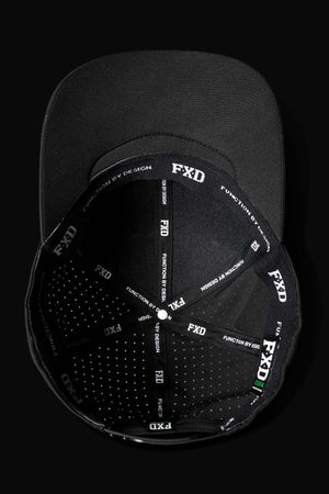 The FXD CP-12 Tech Baseball Cap is shown from above, featuring quick-drying stitched panels with "FXD" and "FUNCTION BY DESIGN" in white on black, plus an adjustable snap-back for comfort.