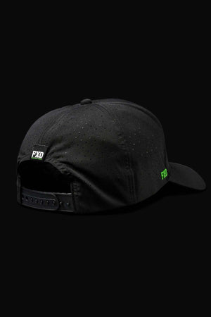 The FXD CP-12 Tech Baseball Cap, shown from the back, is black with an adjustable snap-back strap, small ventilation holes, quick-dry fabric, and green "FXD" logos on the strap and side.