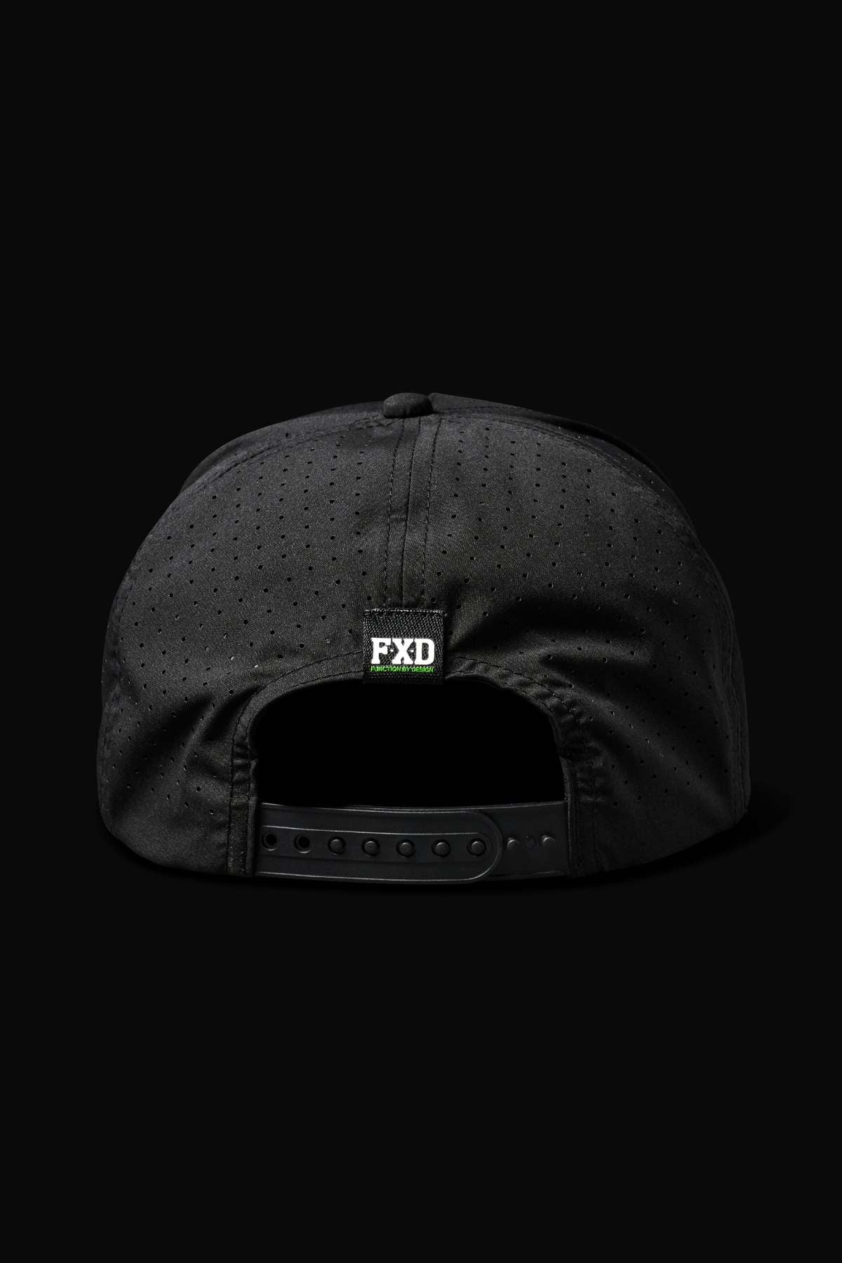 The FXD CP-12 Tech Baseball Cap, shown from the back on a solid black background, is black and perforated with a quick-drying design, an adjustable snap-back strap, and a small rectangular "FXD" logo tag above the opening.
