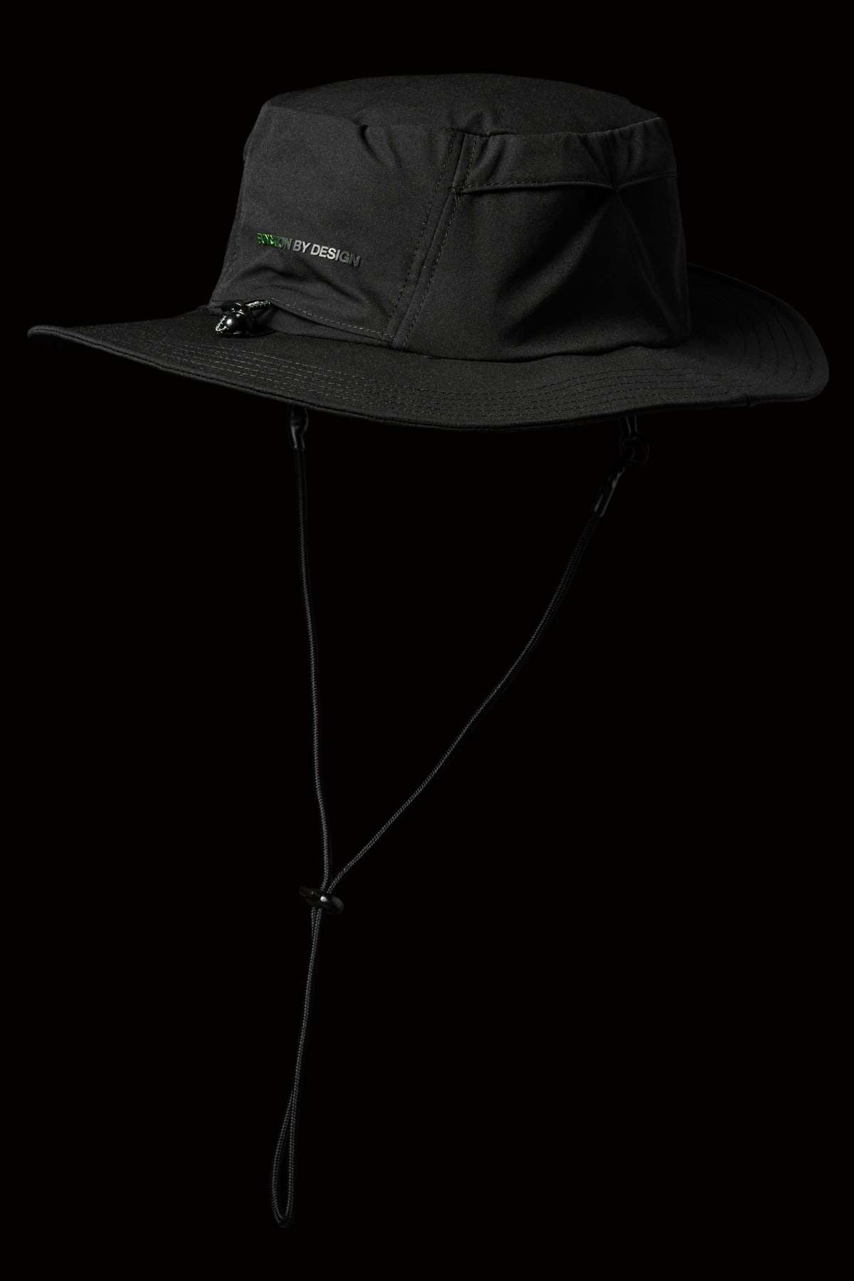The FXD CP-14 Boonie Hat in black offers sun protection, lightweight construction, an adjustable chin strap, and a zippered side pocket—all showcased on a black background.