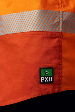 Close-up image of an FXD LSH-2T stretch taped hi-vis long-sleeve work shirt crafted from 145gsm stretch ripstop fabric, showcasing a 50mm reflective tape near the top and an "FXD" brand tag with a green background at the bottom.