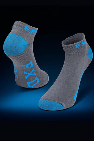 The FXD SK-3 Ankle Sock 5 Pack includes durable gray work socks with blue accents on the heel, toe, and sole, plus "FXD" in blue. They feature a padded foot bed for comfort and are displayed on a blue gradient background.