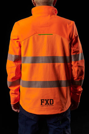 A person is standing with their back to the camera, donning a vibrant FXD WO-3T Hi Vis Soft Shell Work Jacket in bright orange with reflective stripes. This 3-layer polyester softshell, featuring "FXD" and "FUNCTION BY DESIGN," is breathable as well as wind and water-resistant. The black background makes both the individual and the jacket stand out vividly.