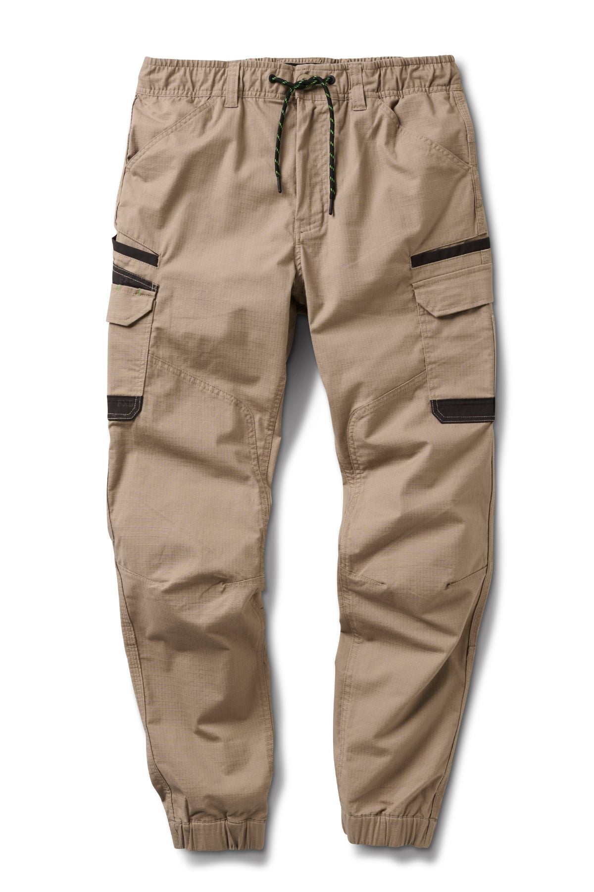 The FXD WP-12C are tan cargo jogger pants featuring black zipper utility pockets, an elastic drawstring waistband, and elastic ankle cuffs.