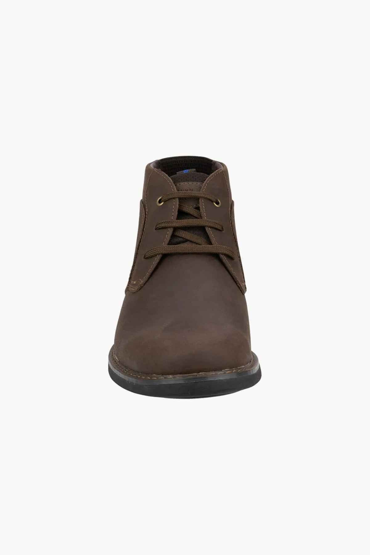 Front view of the Florsheim Otto Chukka Boot displays its rich brown leather upper, dark shoelaces, and black sole against a white background.