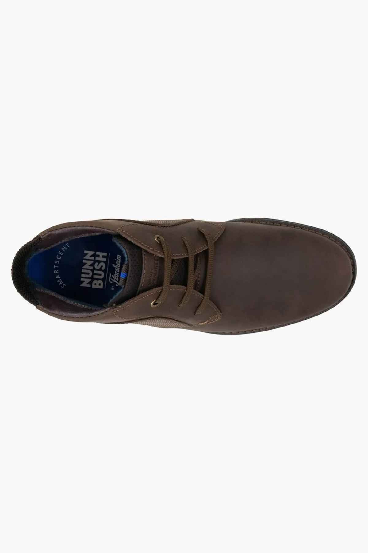 Top view of a brown leather casual shoe featuring laces, a textured leather upper, and the brand name on the cushioned footbed, similar to the Florsheim Otto Chukka Boot.