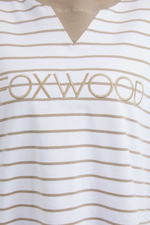 The Foxwood Simplified Stripe Crew, featuring a V-neck and beige visible undershirt, offers a relaxed fit with 100% cotton fabric. It showcases beige and white stripes and has "FOXWOOD" embroidered across the chest in beige.