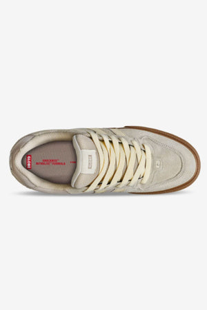 Top view of the Globe Encore-2 sneaker in beige suede with cream laces, brown outsole, cushioned insole, and a red Nike logo on the insole.